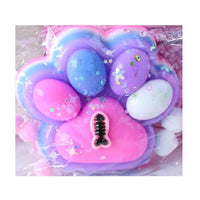 Jucarie Antistres Squishy, cu Revenire Lenta, Model Labuta de Pisica, cu Pestisor, 220g, 12.5 x 10.5 cm Squeeze Pinch Family, Ambalaj Transparent, Roz-Multicolor